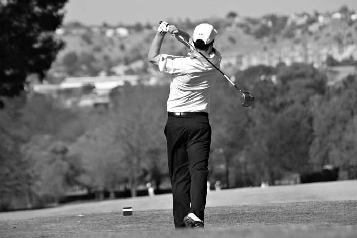 Man Playing Golf