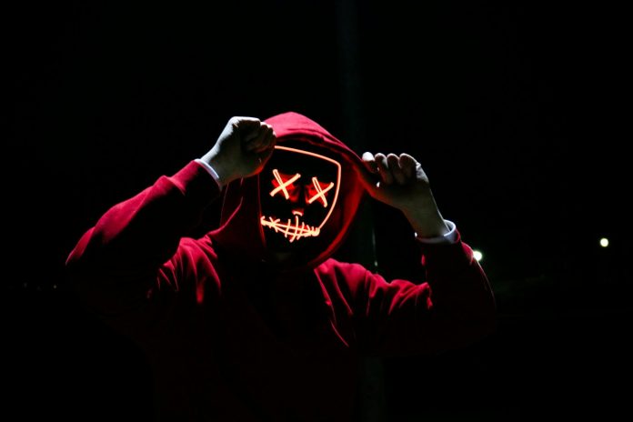 Person Wearing Red Hoodie